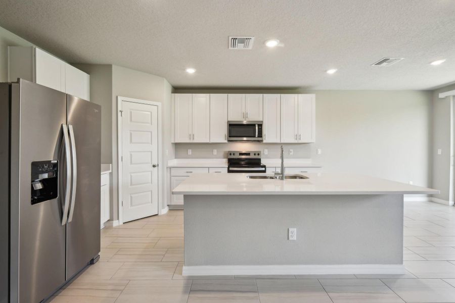 Spacious, unfurnished interior of a new home in Hampton Park - Classic Series, Vero Beach (Image 22).