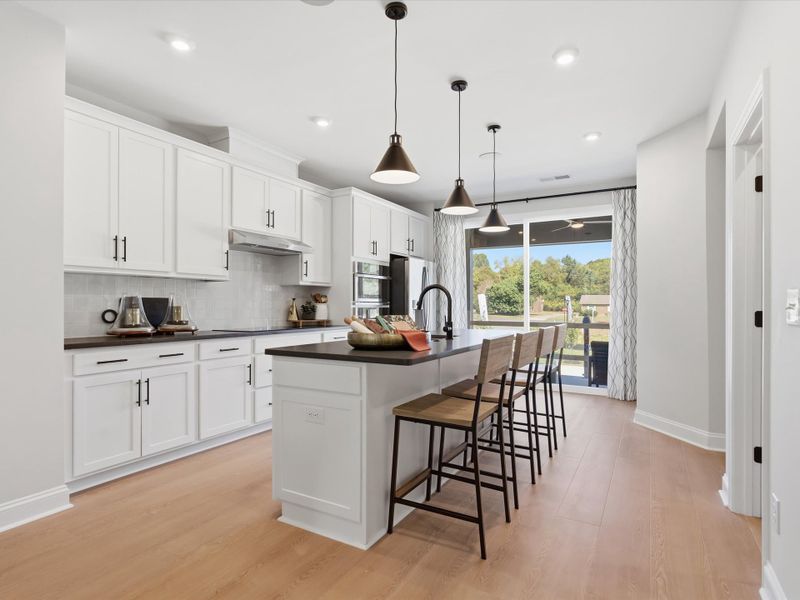 Representative furnished interior of a home built from the Dahlia by Tri Pointe Homes in Bellflower, Charlotte (Image 12).