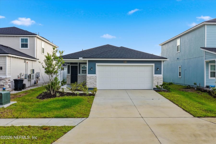 Front exterior of a new home in , St. Augustine, FL, highlighting curb appeal (Image 27).