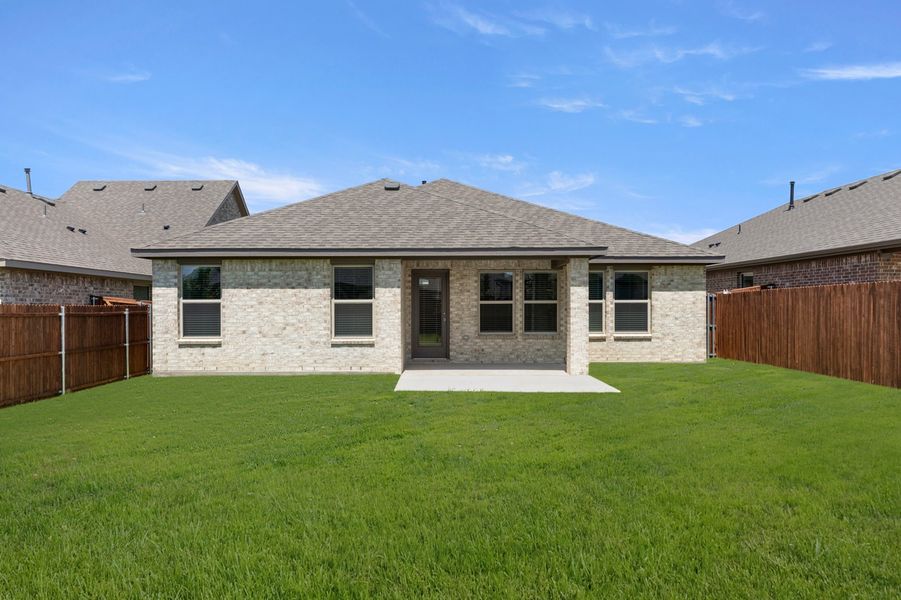 Front exterior of a new home in Northspur, Terrell, TX, highlighting curb appeal (Image 26).
