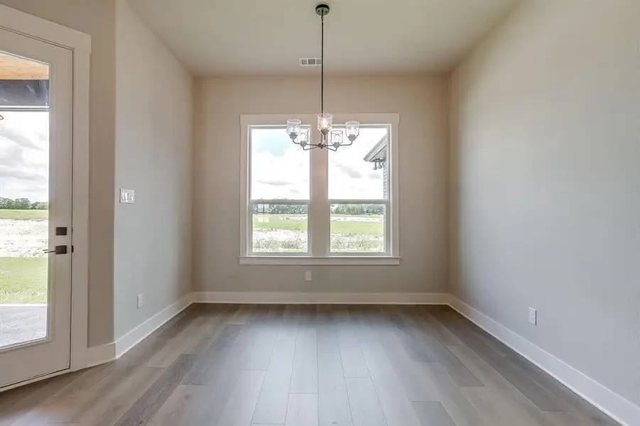 Spacious, unfurnished interior of a new home in Peaks at Lone Elm, Waxahachie (Image 25). Spacious, unfurnished interior of a new home in Peaks at Lone Elm, Waxahachie (Image 25).
