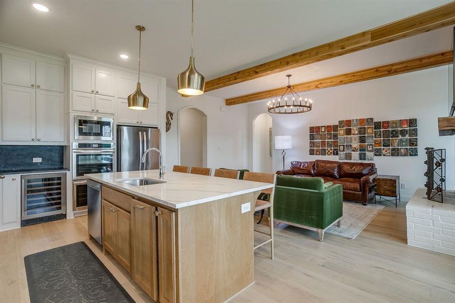 Built-in beverage refrigerator, double ovens