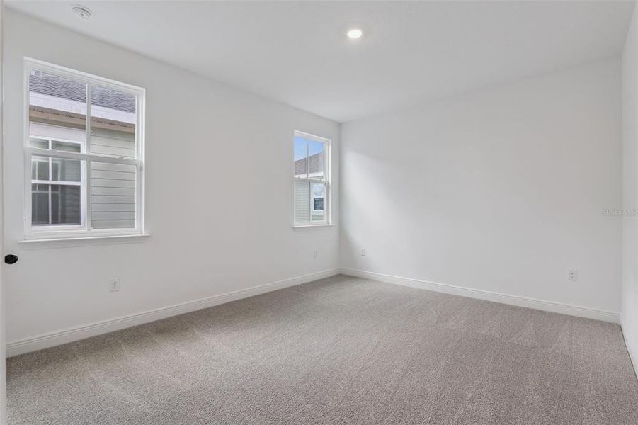 Spacious, unfurnished interior of a new home in Laureate Park (Craft Homes), Orlando (Image 30).