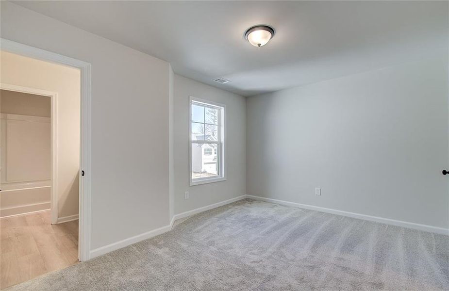 Spacious, unfurnished interior of a new home in Crofton Place Enclave, Snellville (Image 32).