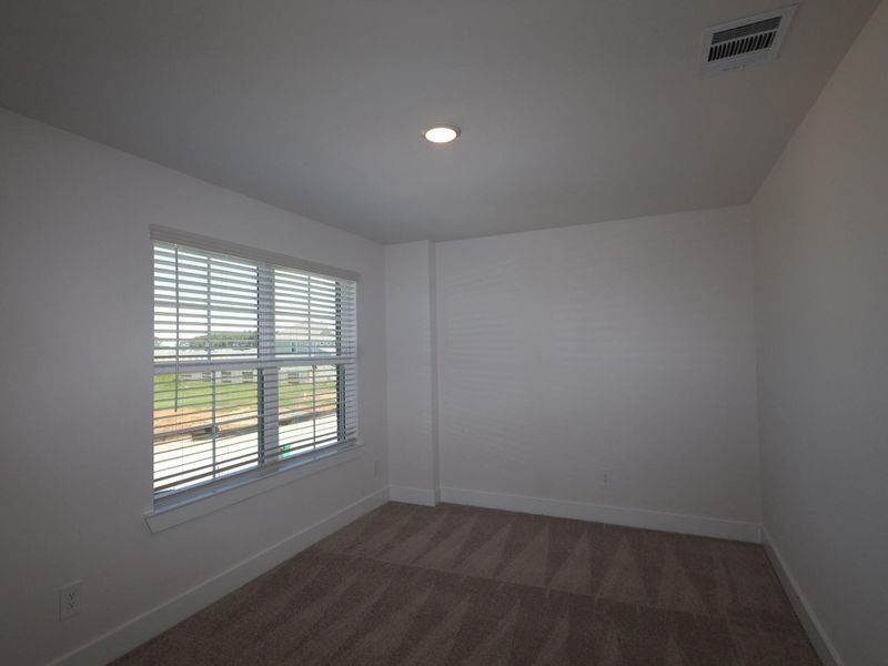 Spacious, unfurnished interior of a new home in Sorella, Tomball (Image 21).