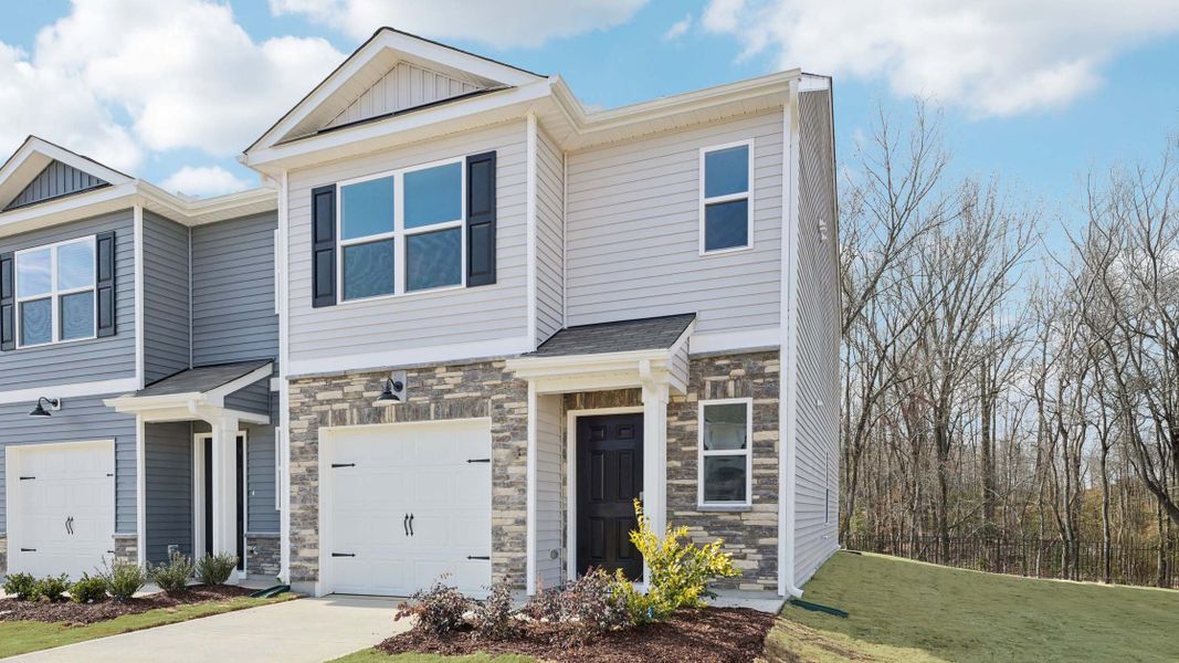 Representative exterior photo of a completed home built from the Pearson by D.R. Horton in The Townes at Laurel Oaks, Sanford, NC (Image 20).