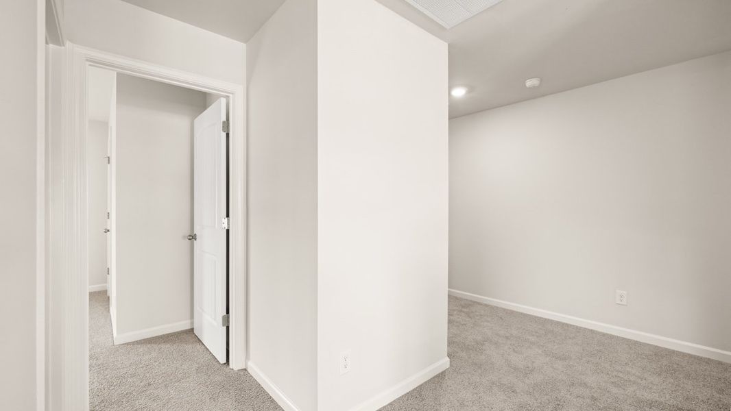 Representative unfurnished interior of a home built from the Elle by D.R. Horton in South Wind, South Fulton (Image 27).
