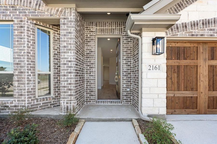 Exterior details and patio area of a home in Stone River Glen 50s, Royse City (Image 26). Exterior details and patio area of a home in Stone River Glen 50s, Royse City (Image 26).