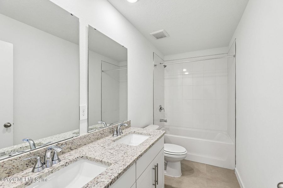 Furnished interior view inside a new home in The District at Oakleaf - The Commons, Middleburg (Image 11).