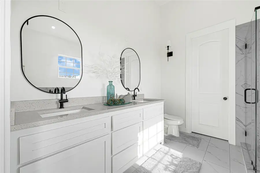 Elegant double vanity for added convenience and style.