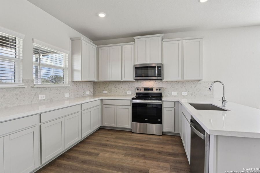 Furnished interior view inside a new home in Estancia Ranch - Premier Series, San Antonio (Image 12). Furnished interior view inside a new home in Estancia Ranch - Premier Series, San Antonio (Image 12).