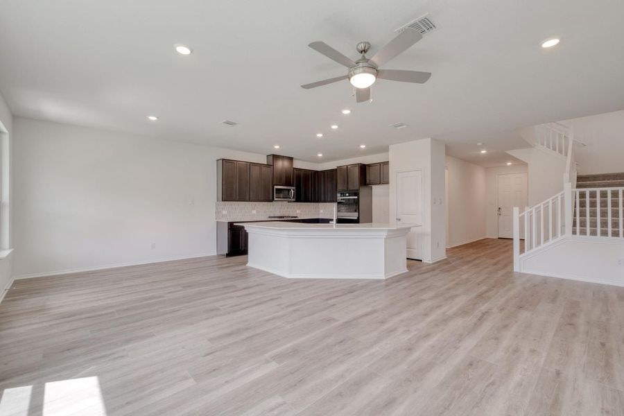 Spacious, unfurnished interior of a new home in River Bluff, Leander (Image 6).