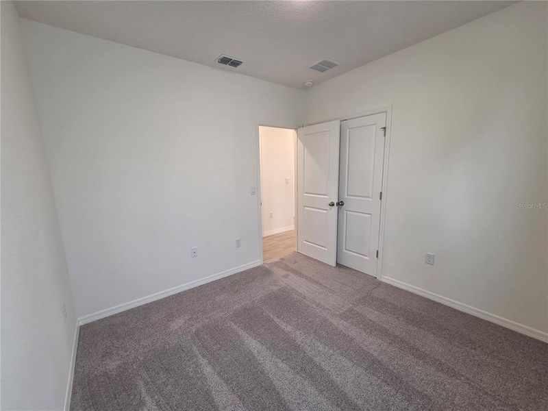 Spacious, unfurnished interior of a new home in Hammock Reserve, Haines City (Image 28). Spacious, unfurnished interior of a new home in Hammock Reserve, Haines City (Image 28).