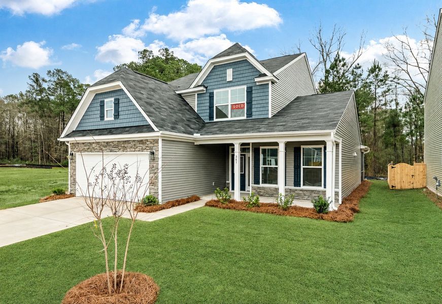Front exterior of a new home in Oakley Pointe, Moncks Corner, SC, highlighting curb appeal (Image 2).