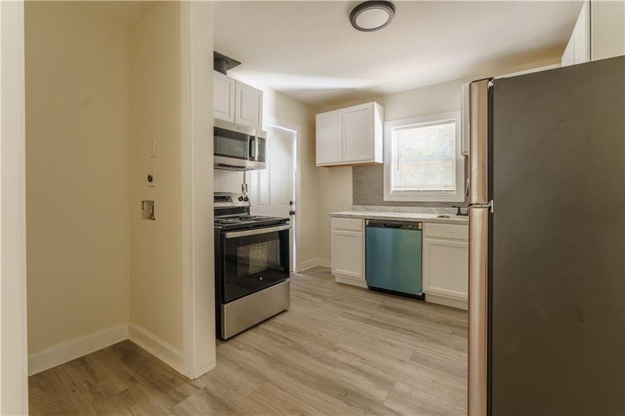 Furnished interior view inside a new home in , Atlanta (Image 5).