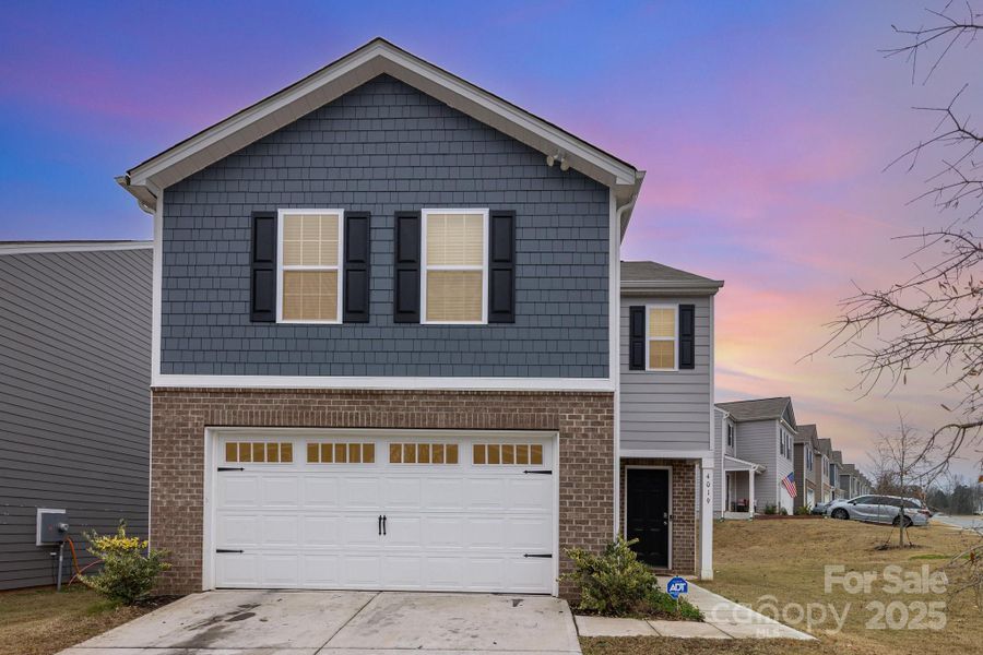 Front exterior of a new home in Abrial Ridge, York, SC, highlighting curb appeal (Image 1). Front exterior of a new home in Abrial Ridge, York, SC, highlighting curb appeal (Image 1).