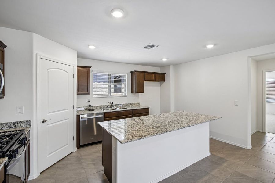 Furnished interior view inside a new home in Mandarina Reserve, Marana (Image 7).