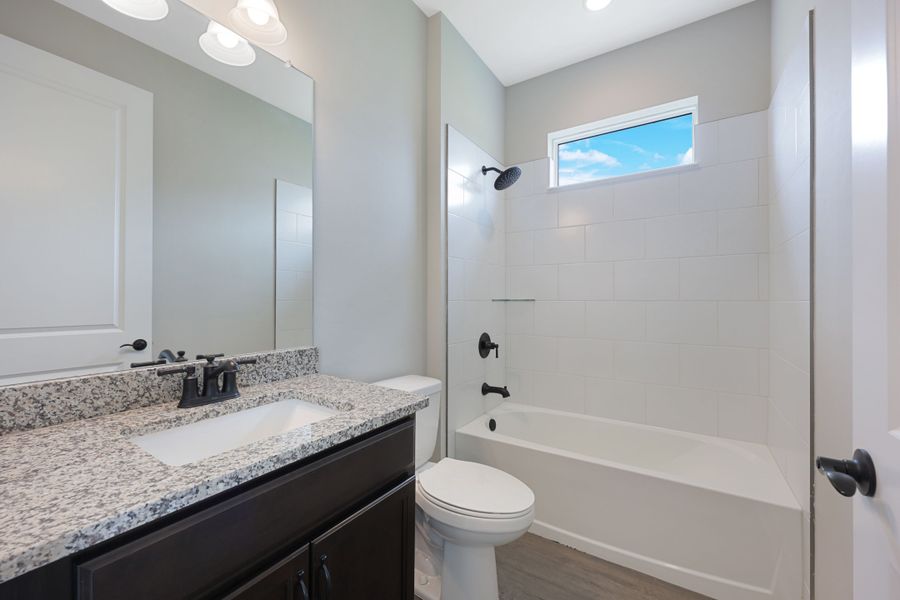 Representative furnished interior of a home built from the Jupiter by William Ryan Homes in The Sanctuary – Royal Collection, Punta Gorda (Image 7).
