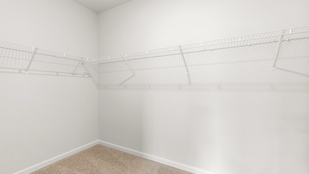 Representative unfurnished interior of a home built from the Booth by D.R. Horton in Liberty Crossing, Braselton (Image 24).