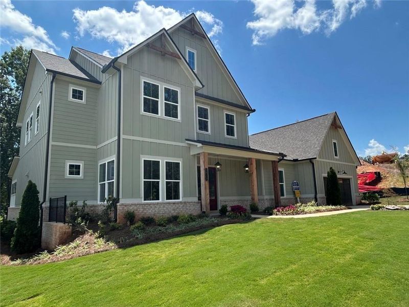 Front exterior of a new home in , Gainesville, GA, highlighting curb appeal (Image 16). Front exterior of a new home in , Gainesville, GA, highlighting curb appeal (Image 16).