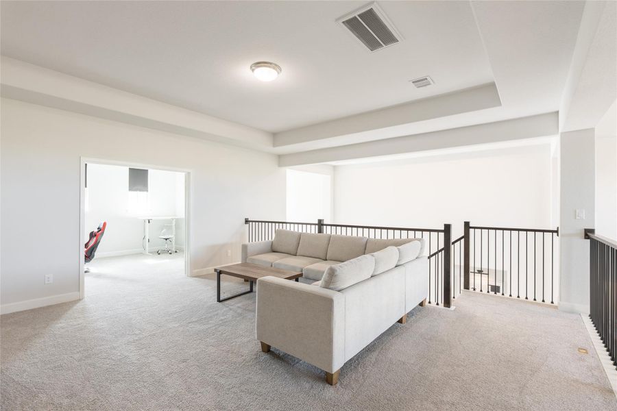 Furnished interior view inside a new home in Elyson, Katy (Image 41).