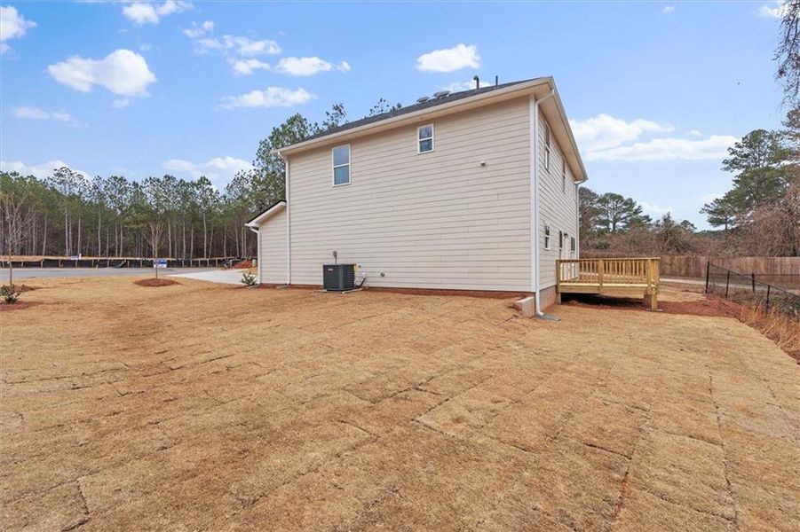 Exterior details and patio area of a home in Canterbury Villas, Carrollton (Image 26).