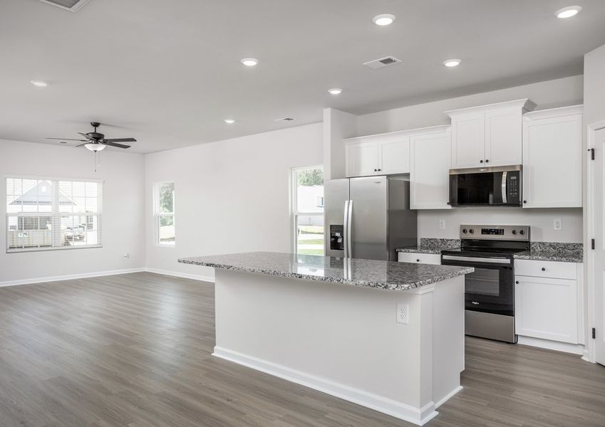 The kitchen is open to the living area