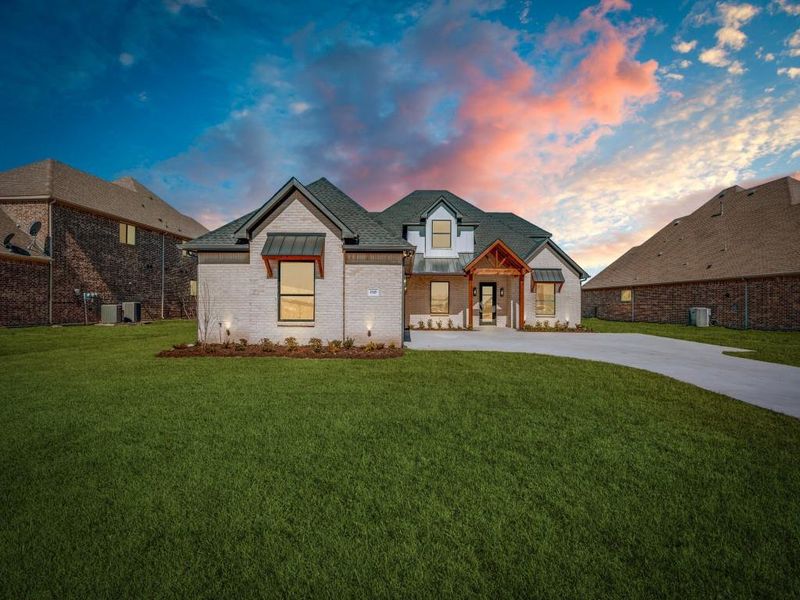 Front exterior of a new home in , Gunter, TX, highlighting curb appeal (Image 1).