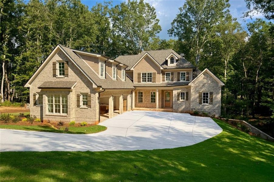 Front exterior of a new home in , Monroe, GA, highlighting curb appeal (Image 1). Front exterior of a new home in , Monroe, GA, highlighting curb appeal (Image 1).