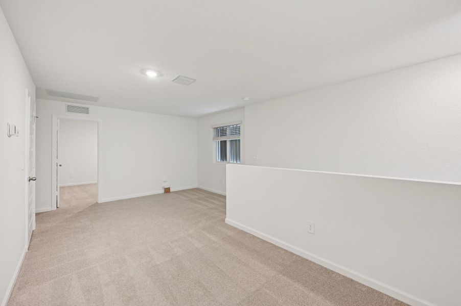 Spacious, unfurnished interior of a new home in Meritage Homes at Terra Lago - Premier Series, Indiantown (Image 14).