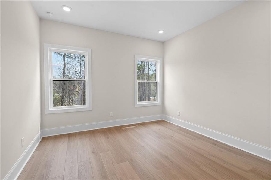 Spacious, unfurnished interior of a new home in Bellwyn, Johns Creek (Image 26).