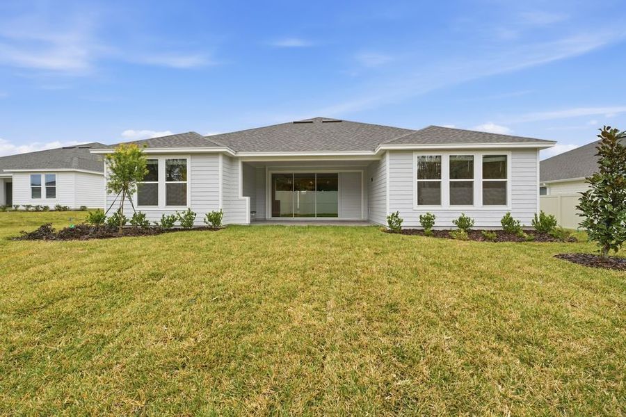 Exterior details and patio area of a home in Headwaters at Lofton Creek, Yulee (Image 24).