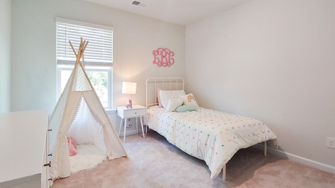 Furnished interior view inside a new home in Garbon Fields, Summerville (Image 17).