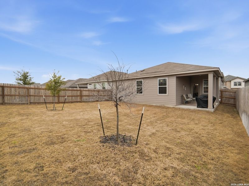 Exterior details and patio area of a home in Hunter's Ranch, San Antonio (Image 21).