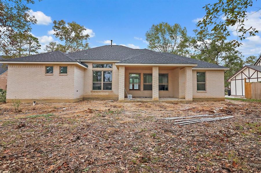 Beyond the interiors, the property includes outdoor spaces perfect for entertaining, such as a spacious covered patio