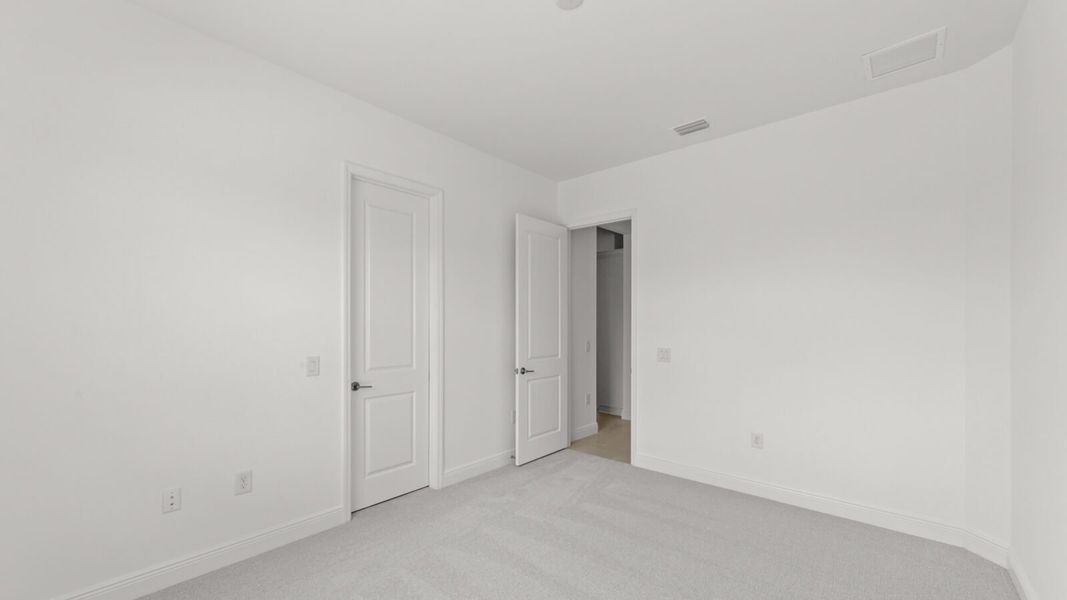 Spacious, unfurnished interior of a new home in Verandah, Fort Myers (Image 24).