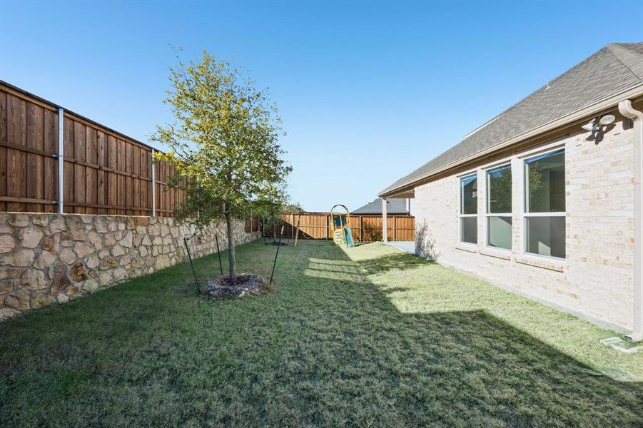 Exterior details and patio area of a home in , McKinney (Image 3). Exterior details and patio area of a home in , McKinney (Image 3).