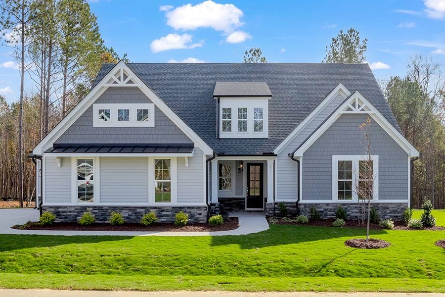 Representative exterior photo of a completed home built from the The Bradley by RobuckHomes in Baylee Ridge, Selma, NC (Image 34). Representative exterior photo of a completed home built from the The Bradley by RobuckHomes in Baylee Ridge, Selma, NC (Image 34).