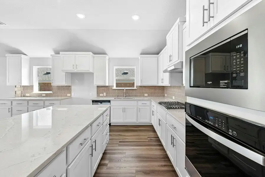 Furnished interior view inside a new home in The Colony, Bastrop (Image 8). Furnished interior view inside a new home in The Colony, Bastrop (Image 8).