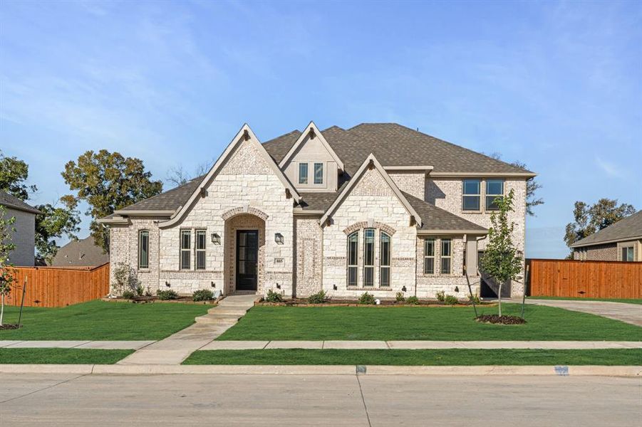 Front exterior of a new home in Hayes Crossing, Midlothian, TX, highlighting curb appeal (Image 2).