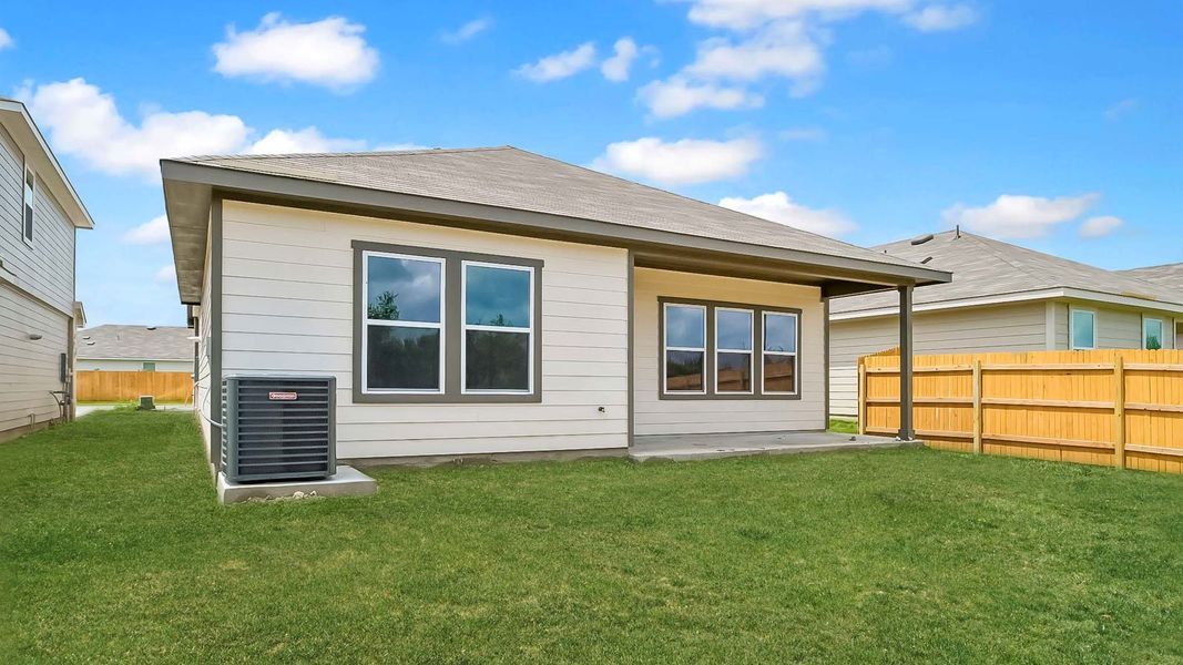Exterior details and patio area of a home in Prairie Lakes, Buda (Image 3).