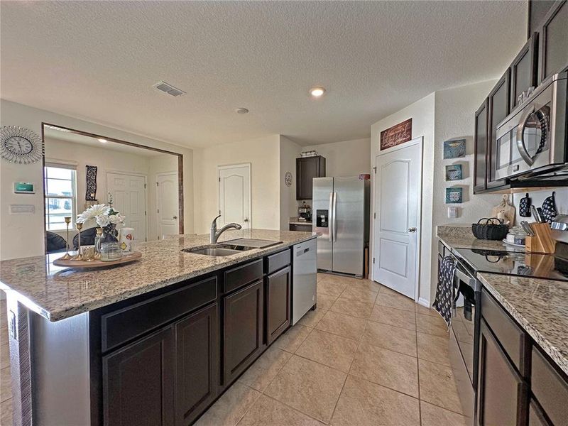 Furnished interior view inside a new home in , Harmony (Image 10).