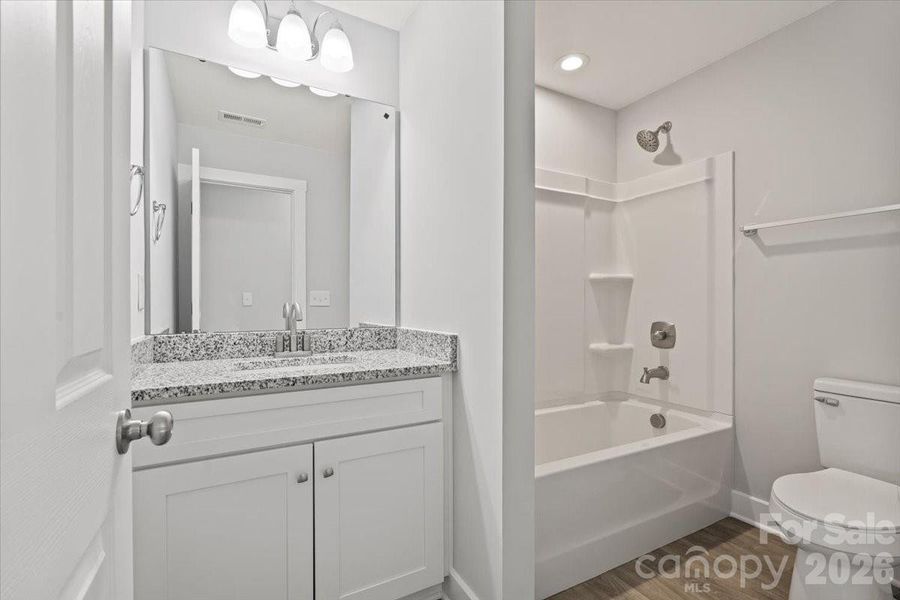 Furnished interior view inside a new home in , Monroe (Image 12).