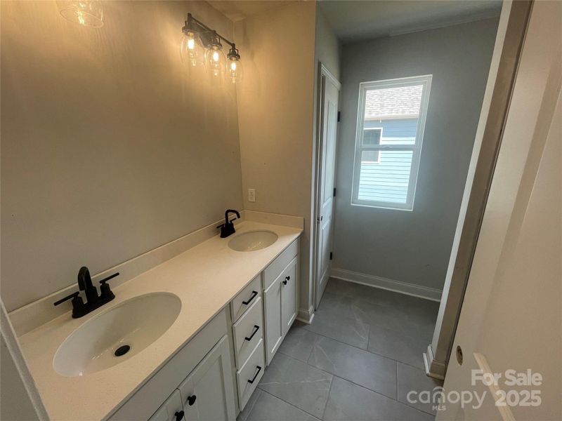 Primary Bath, Dual Sinks, Drawers in Vanity, Linen Closet and large shower