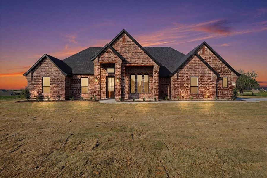 Front exterior of a new home in , Springtown, TX, highlighting curb appeal (Image 21).
