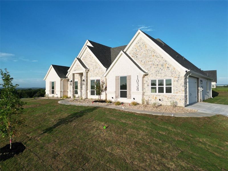 Front exterior of a new home in , Azle, TX, highlighting curb appeal (Image 22).