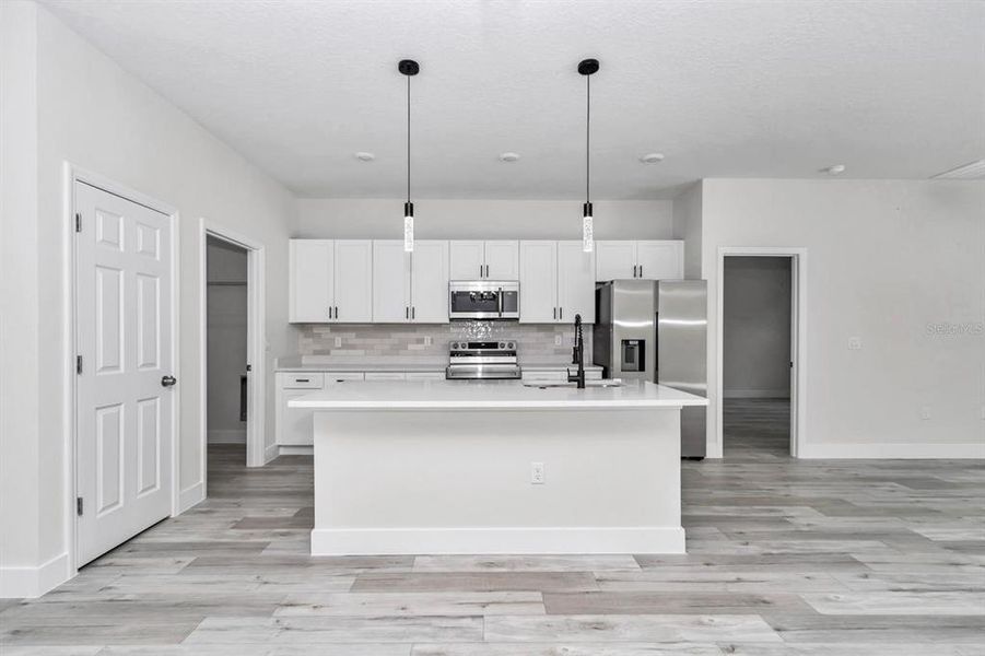Furnished interior view inside a new home in , Poinciana (Image 6). Furnished interior view inside a new home in , Poinciana (Image 6).