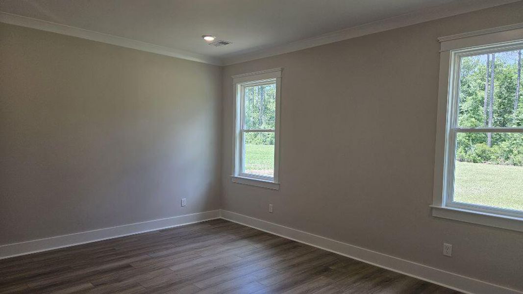 Spacious, unfurnished interior of a new home in The Enclave at French Quarter Creek, Huger (Image 18).
