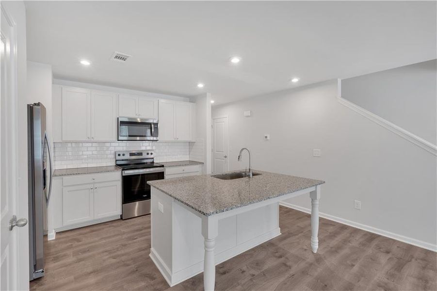 Furnished interior view inside a new home in Village Green, Adairsville (Image 5).