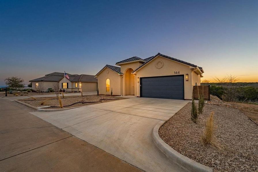 Front exterior of a new home in , Glen Rose, TX, highlighting curb appeal (Image 2). Front exterior of a new home in , Glen Rose, TX, highlighting curb appeal (Image 2).